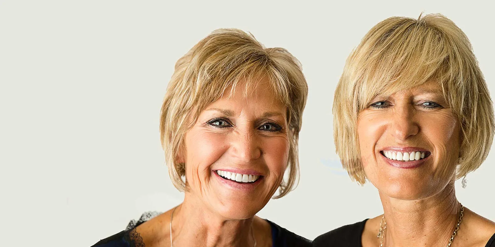 Two smiling Liberty Dental patients