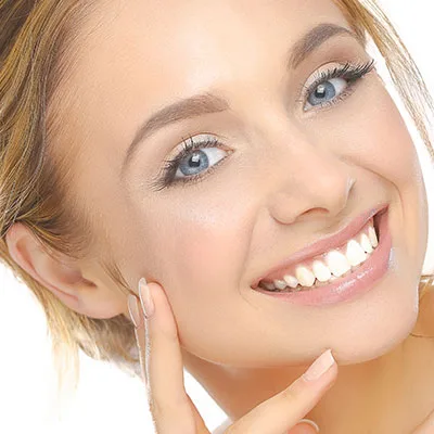 Patient smiling after teeth whitening